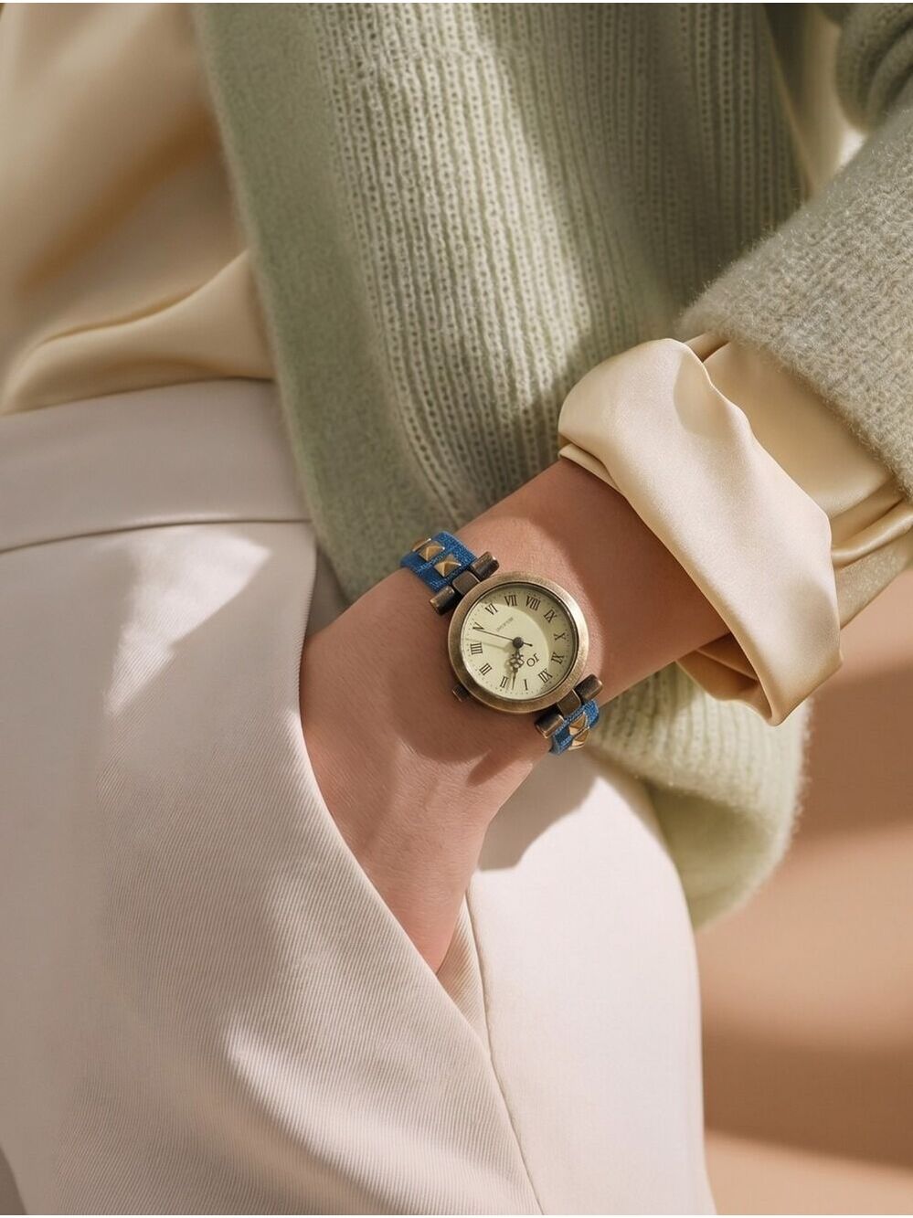 NWT watch blue studded strap bronze case